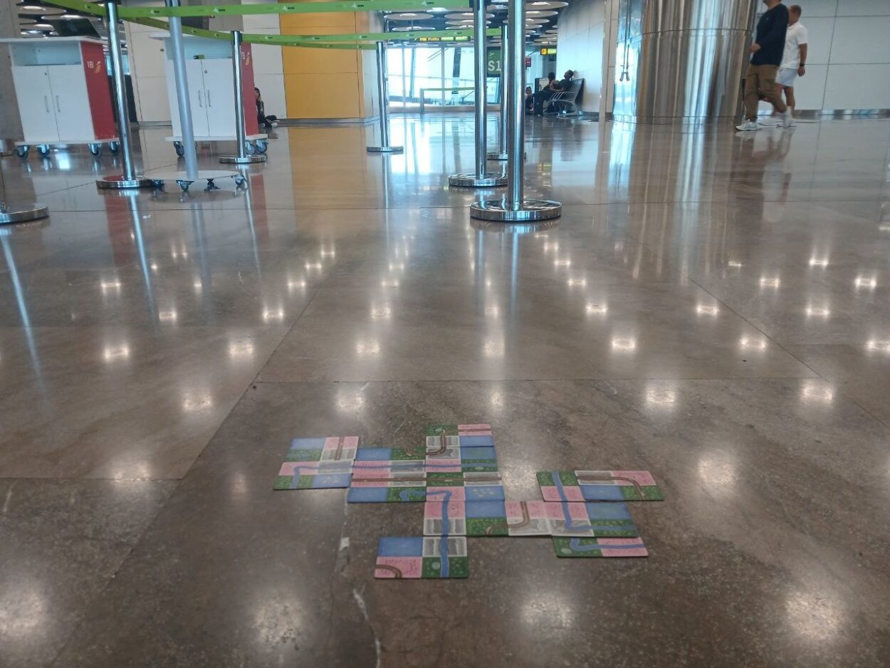 Naturopolis, a version of Sprawlopolis, being played in an airport by the author.