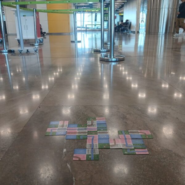 Naturopolis, a version of Sprawlopolis, being played in an airport by the author.